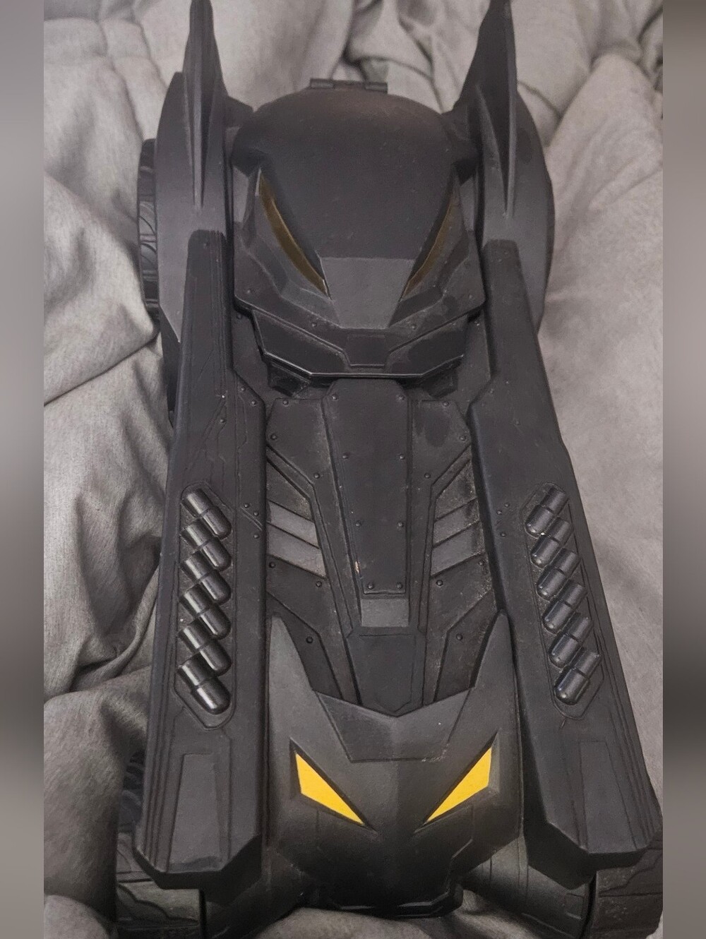 Black Batmobile Toy Car with Yellow Accents. 12in Characters Fit Inside.